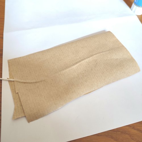 Folding paper over as outer of feather