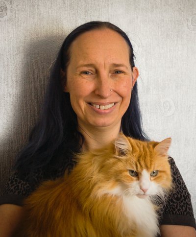 Portrait of Livi (Wirral Whiskers owner) and her cat