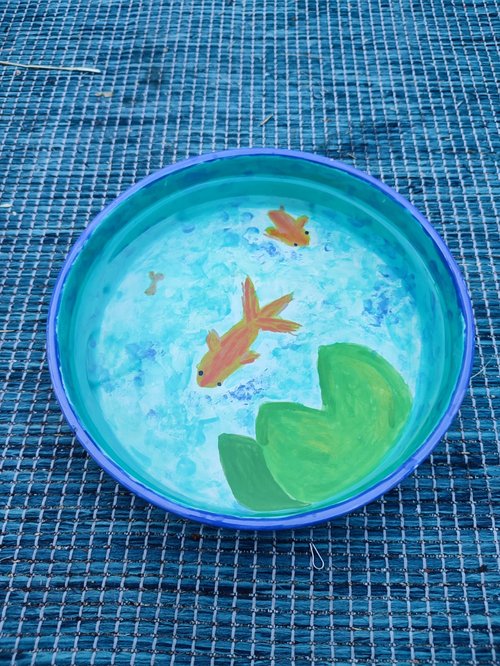Water bowl for cat painted as a pond